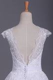 2024 Sexy Wedding Dresses Open Back V Neck A Line Tulle With Applique PSE5S2SN