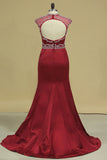 2024 Open Back High Neck Mermaid Prom Dresses Satin With Ruffles And PDEAPFNC