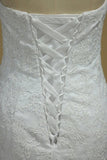 2024 Strapless Mermaid/Trumpet Wedding Dress With Applique P1D1Q8RA