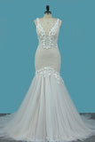 2024 Mermaid Wedding Dresses Straps Tulle With Applique PK32FPC4